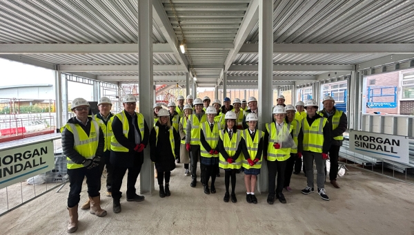 Morgan Sindall construction celebrates with steel signing at the castle school