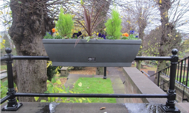 Grounds staff able to water new barrier baskets just once a week